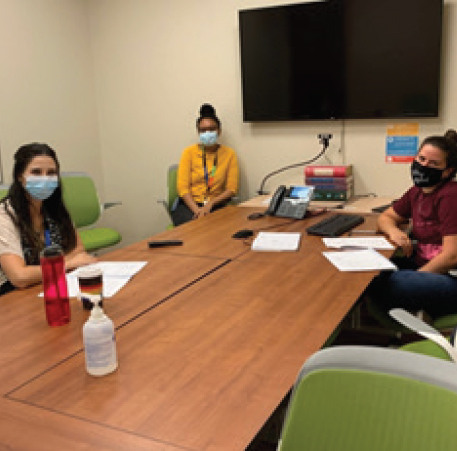 Peer support workers in meeting